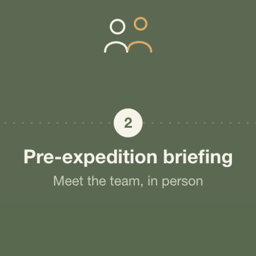 Screen displaying a pre-expedition briefing for team members, with an icon of two people at the top and the text 'Pre-expedition briefing' and 'Meet the team, in person'.
