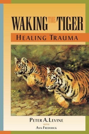 Book cover titled "Waking the Tiger: Healing Trauma" by Peter A. Levine with Ann Frederick, featuring an illustration of two tigers resting on grass in a forested background.