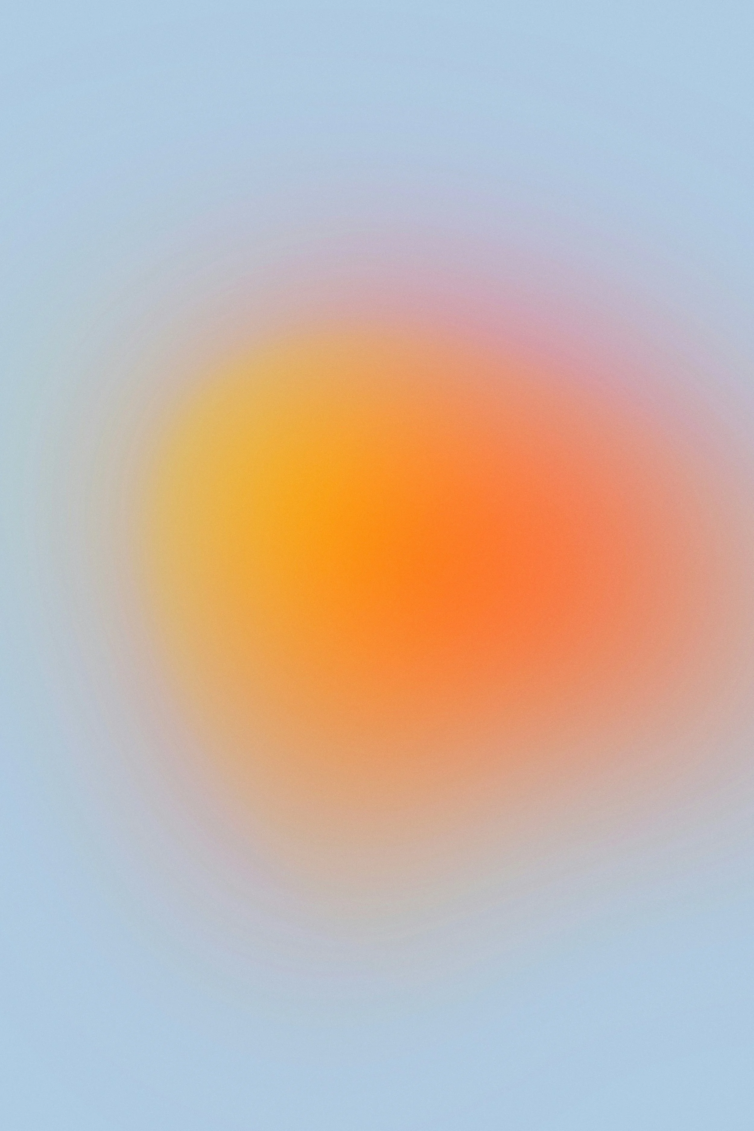 Blurred gradient with pastel colors, mainly light blue with a soft yellow and pink area in the center.