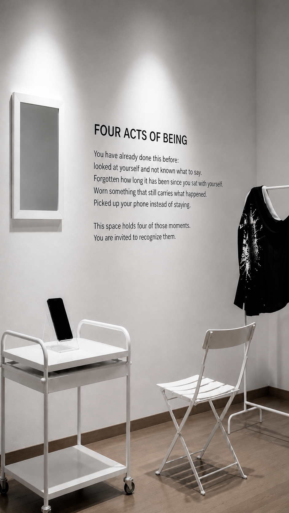 Contemporary installation 4 Acts of Being by Mexican artist Fer Quirarte, featuring a mirror, phone stand, coat rack, and chair that invite four acts of being: questioning, letting go, self-protection, and staying with oneself.