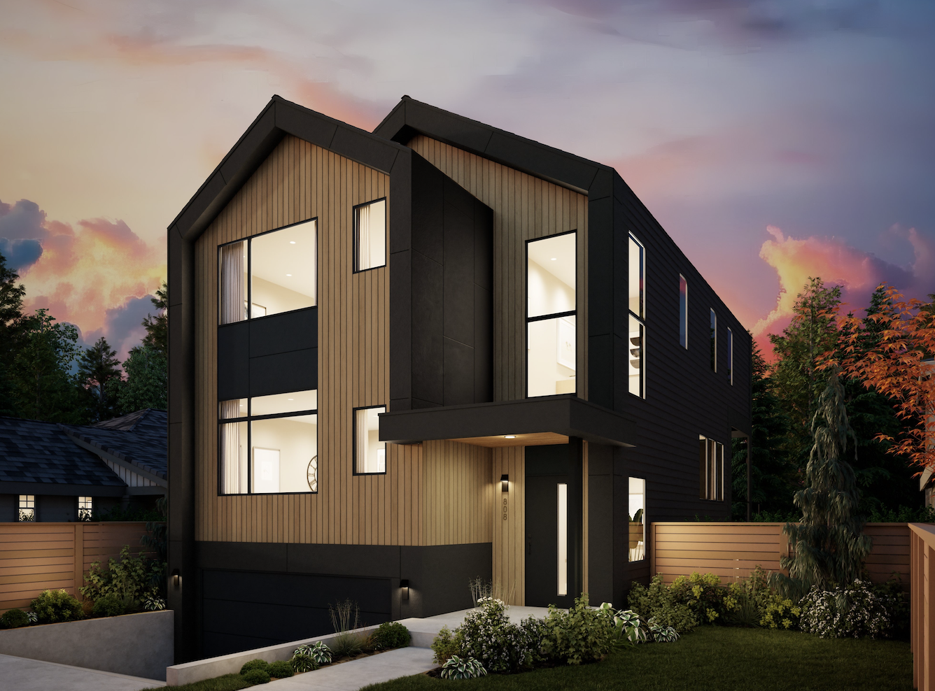 Modern multi-story house during sunset with exterior lighting, vertical wood and black siding, large windows, landscaped front yard, and a wooden fence.