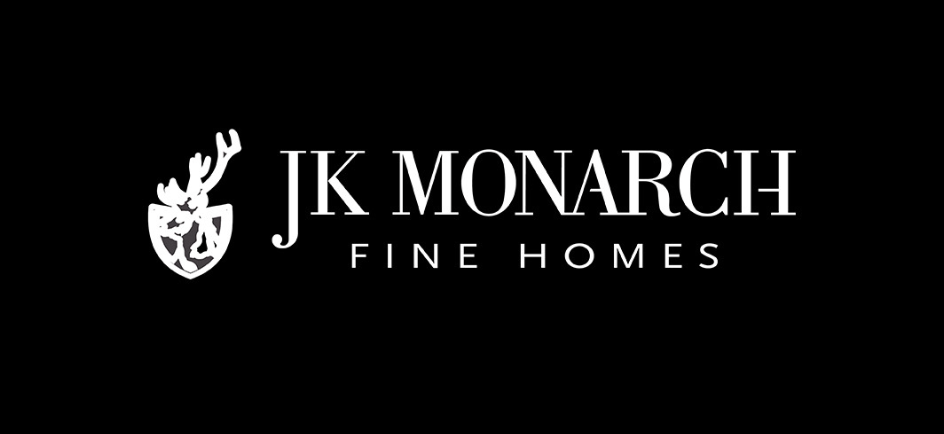 Black background with a white stylized deer head logo on the left and the text 'JK Monarch Fine Homes' in white.