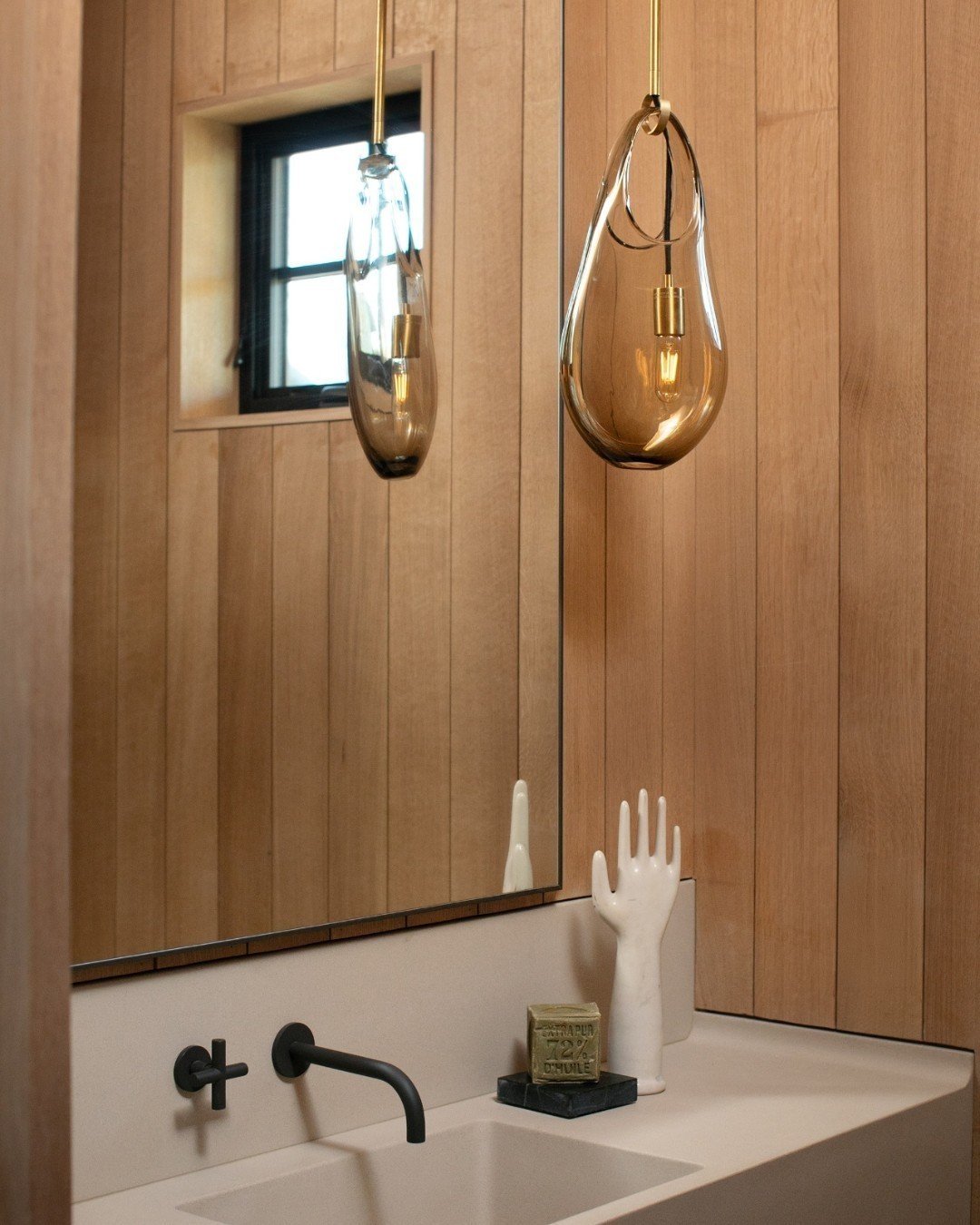 Grateful for all the teamwork and trades that remained committed to our design vision to bring this Powder Room to life. From the custom cast stone vanity top, to the nickel-gap white oak cladding and the antiqued herringbone floors... a lot of thoug