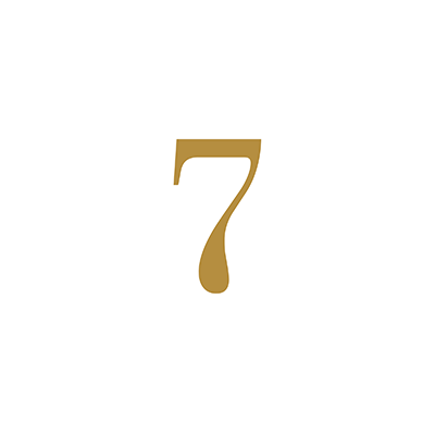 A gold number 7 on a white background.