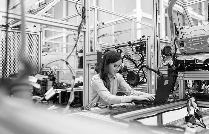 Technology professional working in an advanced manufacturing and engineering environment, representing infrastructure and technology companies using digital marketing and website development.