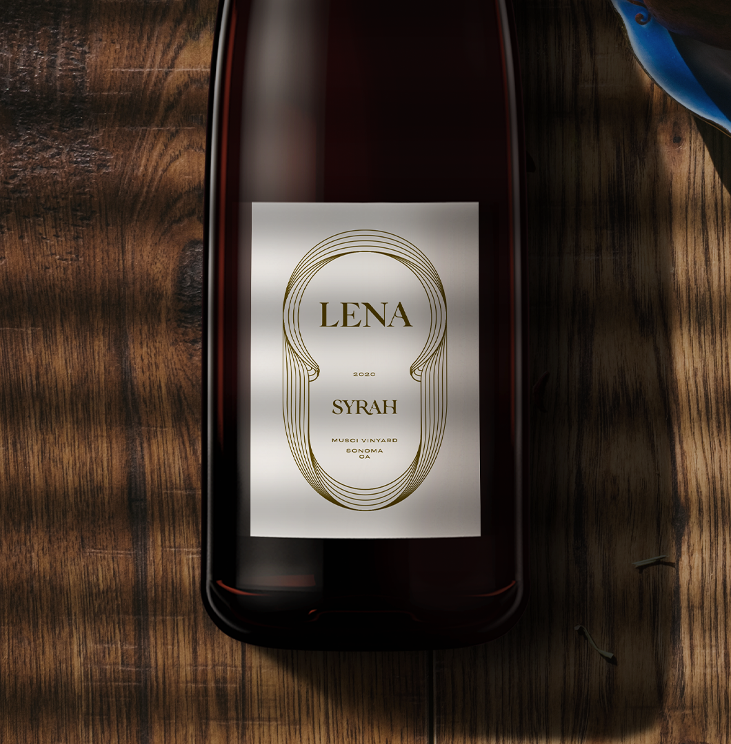 Bottle of Lena winery wine with a white label on a wooden surface