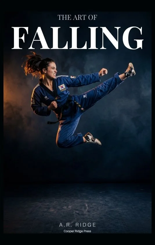 Book cover for “The Art of Falling” by A. R. Ridge featuring a young woman in a blue martial arts uniform performing a high kick against a dark blue background.