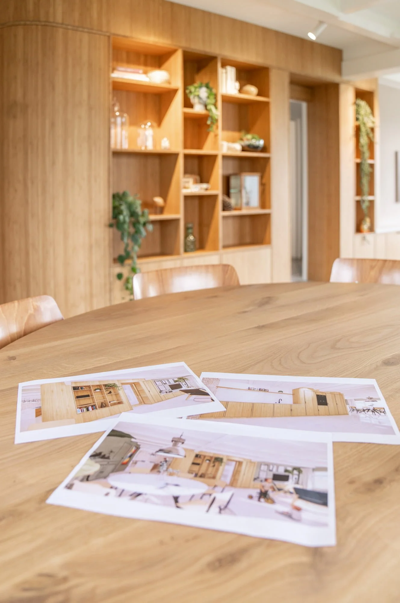 Architectural design presentation with material samples and interior concept drawings