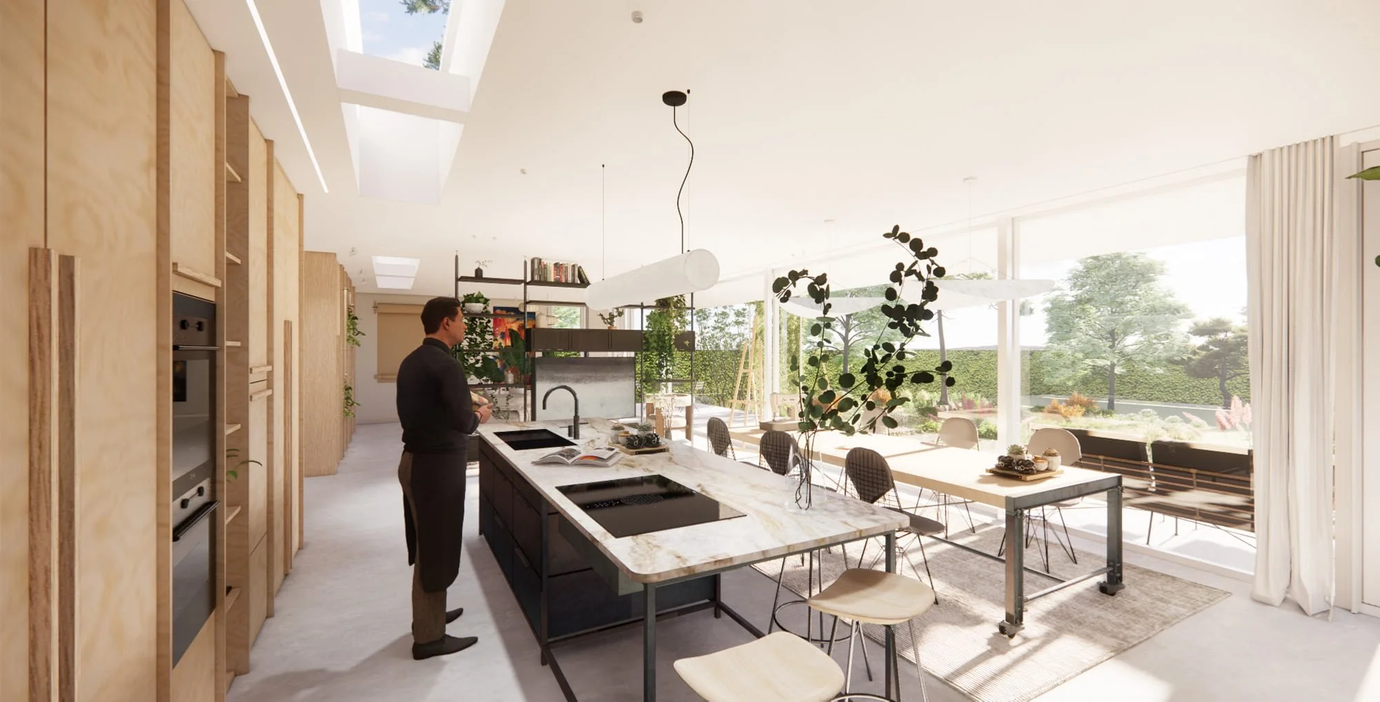 Bright kitchen and dining extension with skylights, indoor greenery and garden views