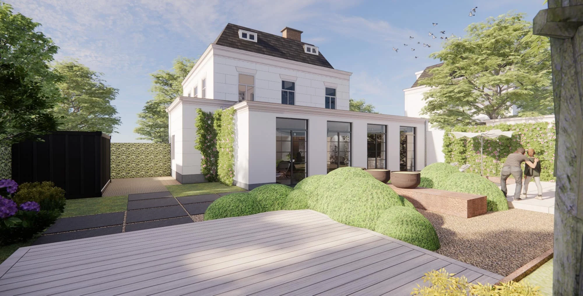 Renovated white villa with formal garden, light gravel path and classic facade detailing