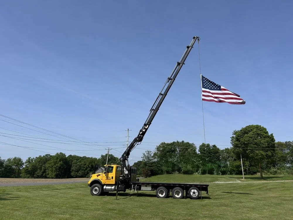boom truck with flag