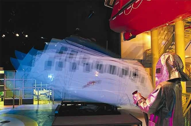 A motion-platform simulator "flew" visitors out to the oil rig as we had many times.