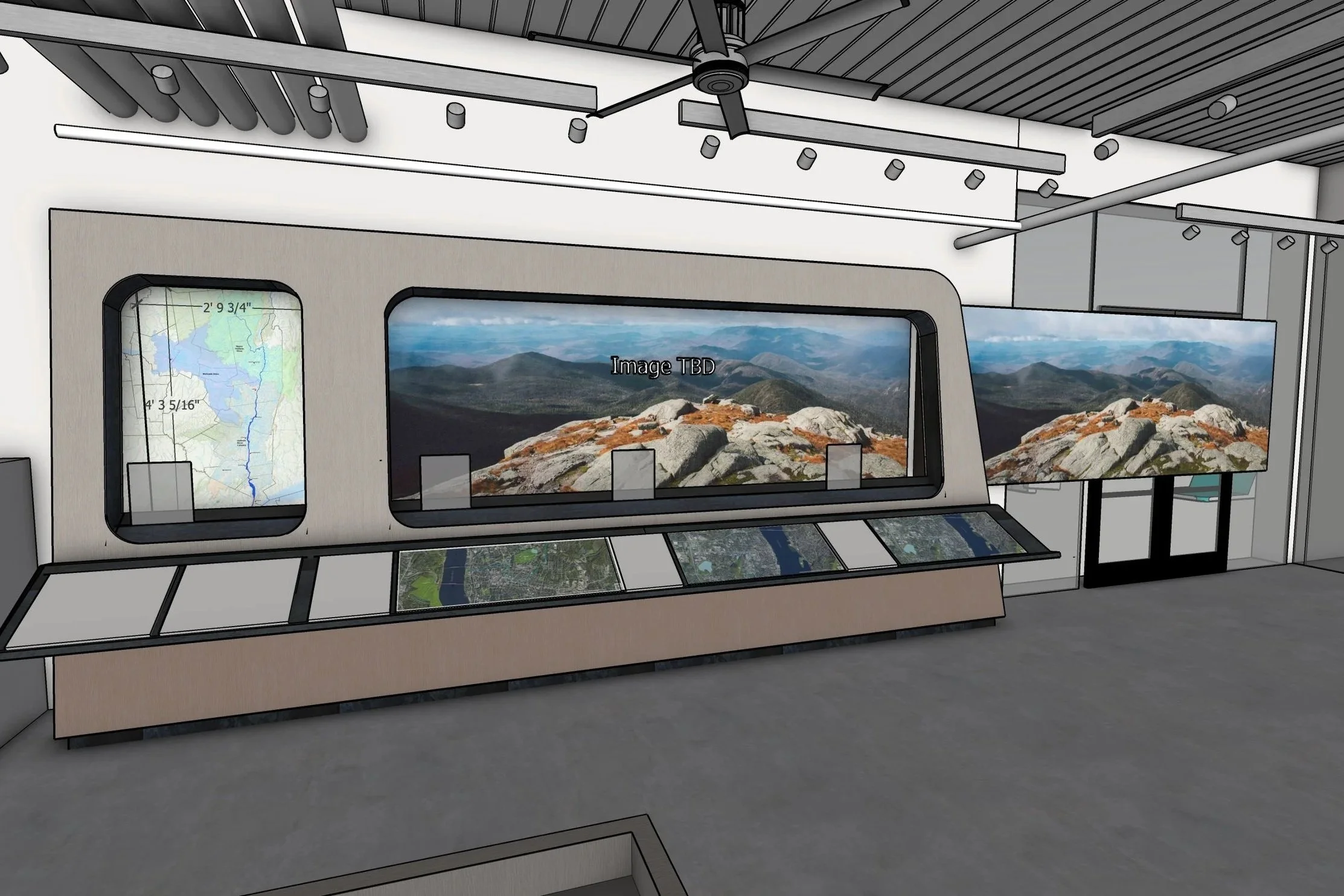 Interior of a modern building with large windows displaying mountain landscapes, ceiling fan, and track lighting.