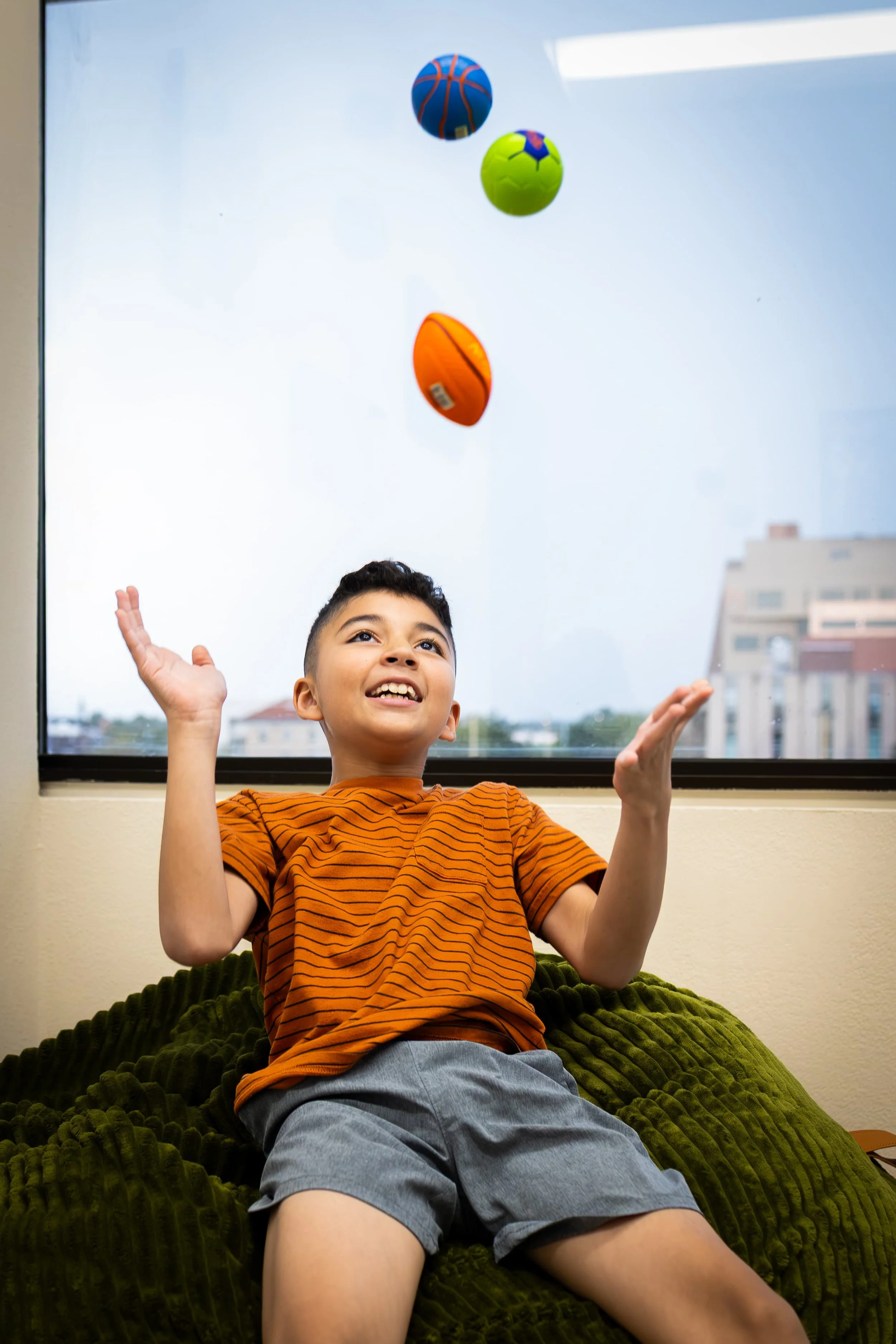 Energized Minds Therapy child patient playing in dedicated child space.