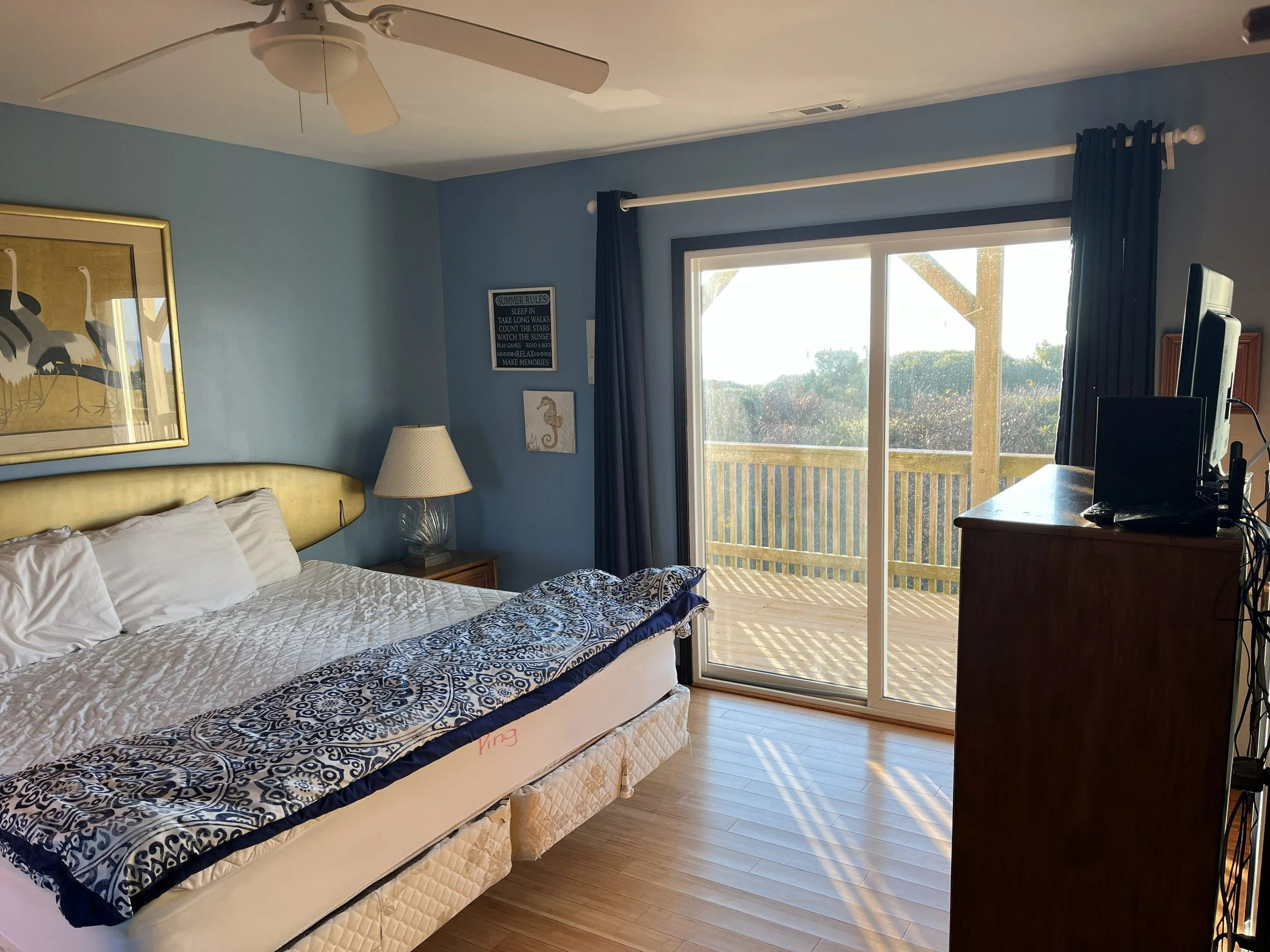 Master Bedroom overlooks the lower deck and beach