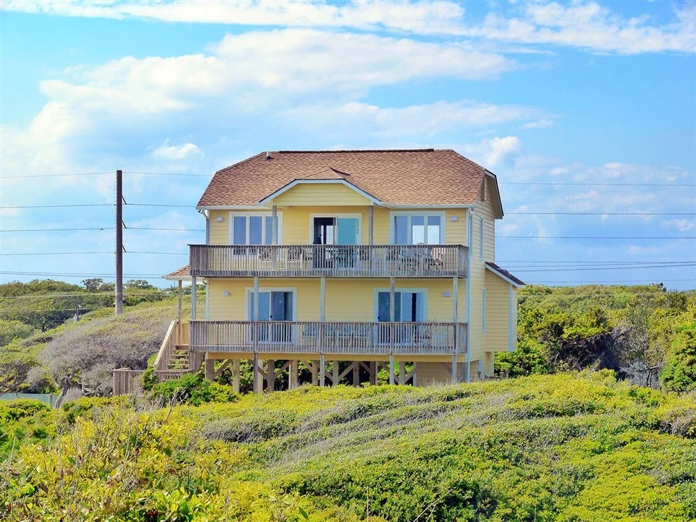 View of the home from the beach deck