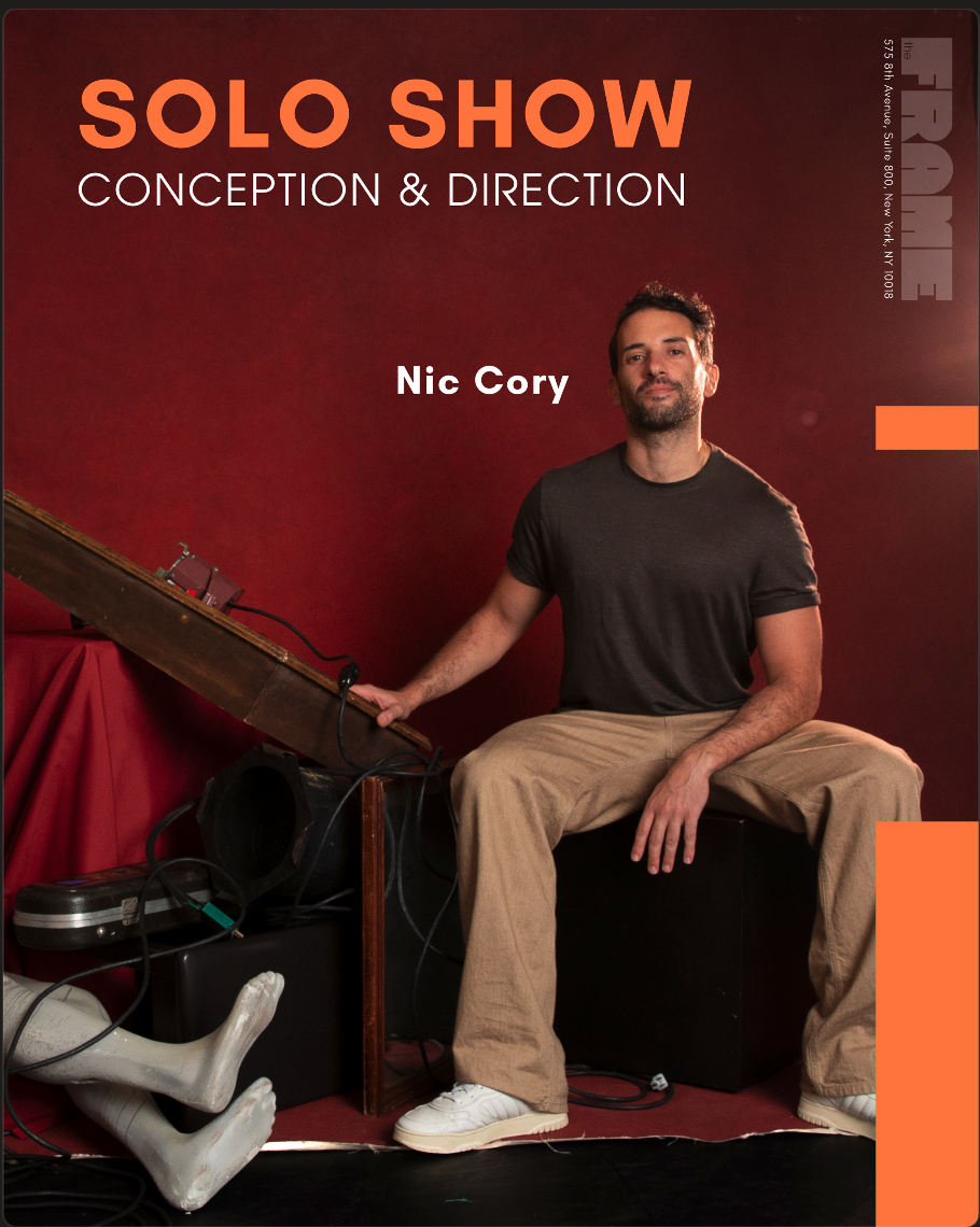 Man sitting on a black box, with a red background, next to a piano. The poster is for a solo show titled 'Conception & Direction' by Nic Cory, taking place at The Fringe, in New York City.