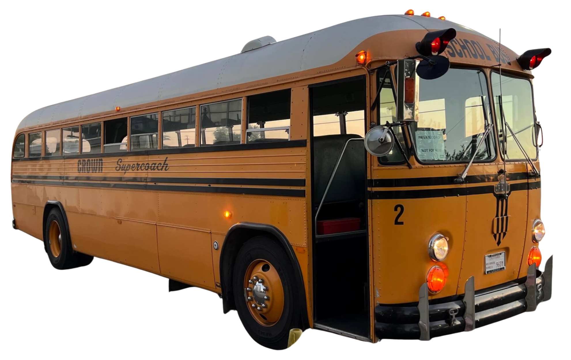 Yellow school bus with open door, black stripes, and the words 'Crown Supercoach' on the side.