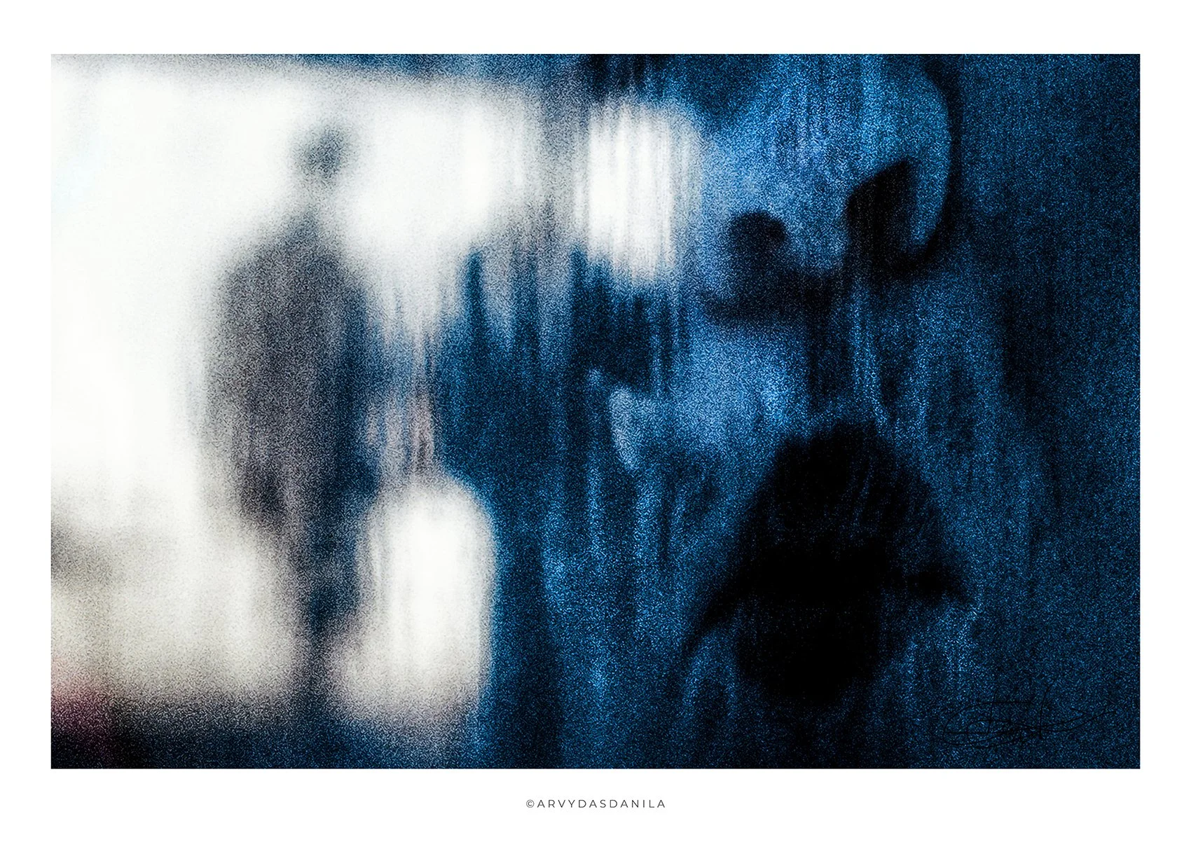 very specific mystic looking image depicting woman face and a human shilhouettes emerging in the background, heavy grain strong character visual blue white theme