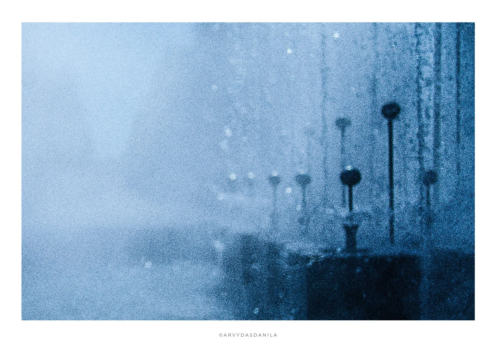 Abstract blue and black textured art with splasheds of a fountain water, extremely grainy visually engaging, creating depth of dissolving background, unique perspective, unorthodox approach to subject matter