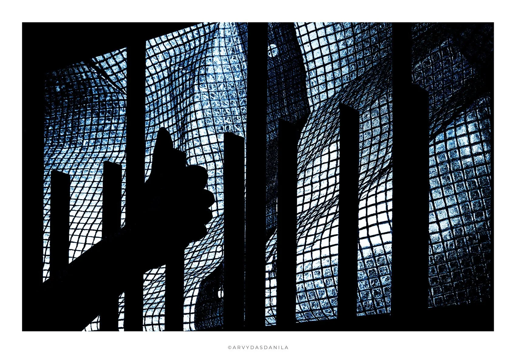 Silhouette of a hand gripping the bars of a metal cage with a textured glass building in the background, very dramatic thought provoking and strong stylistic character.