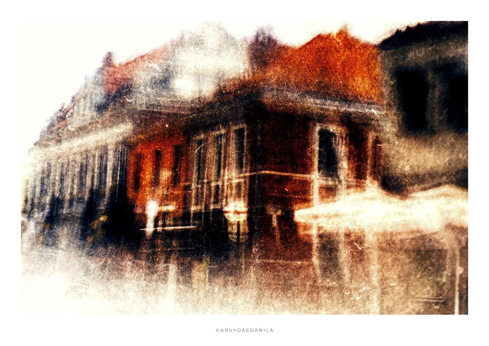 A pixelated, abstract image of a burning building with thick black smoke, orange flames, and a hazy, textured overlay, giving a surreal, artistic impression.