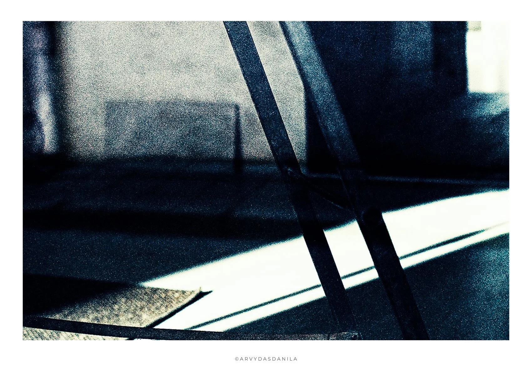 abstract geometrical photograph eith light and shadow interaction impressive artpiece for enlightening any office space and giving special character with diagonal lines and light reflections creating abstract patterns.
