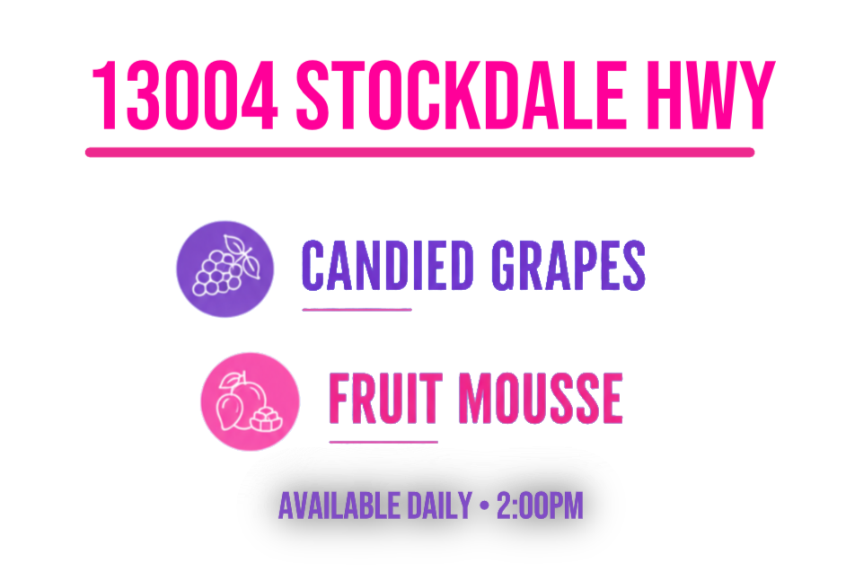 Sign advertising dessert flavors: candied grapes and fruit mousse, available daily at 2:00 PM.