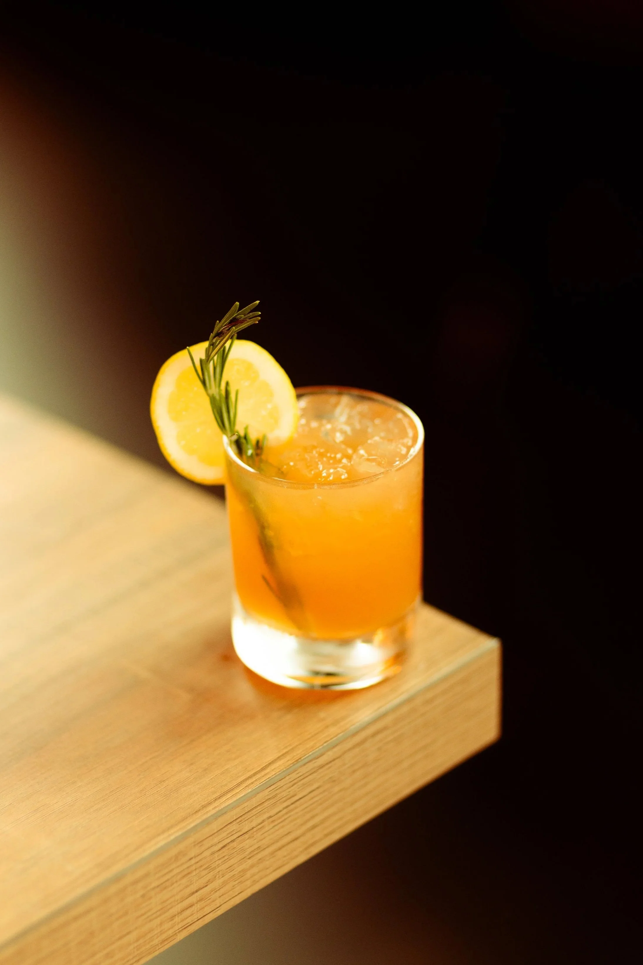 Bourbon, lemon juice, rosemary syrup