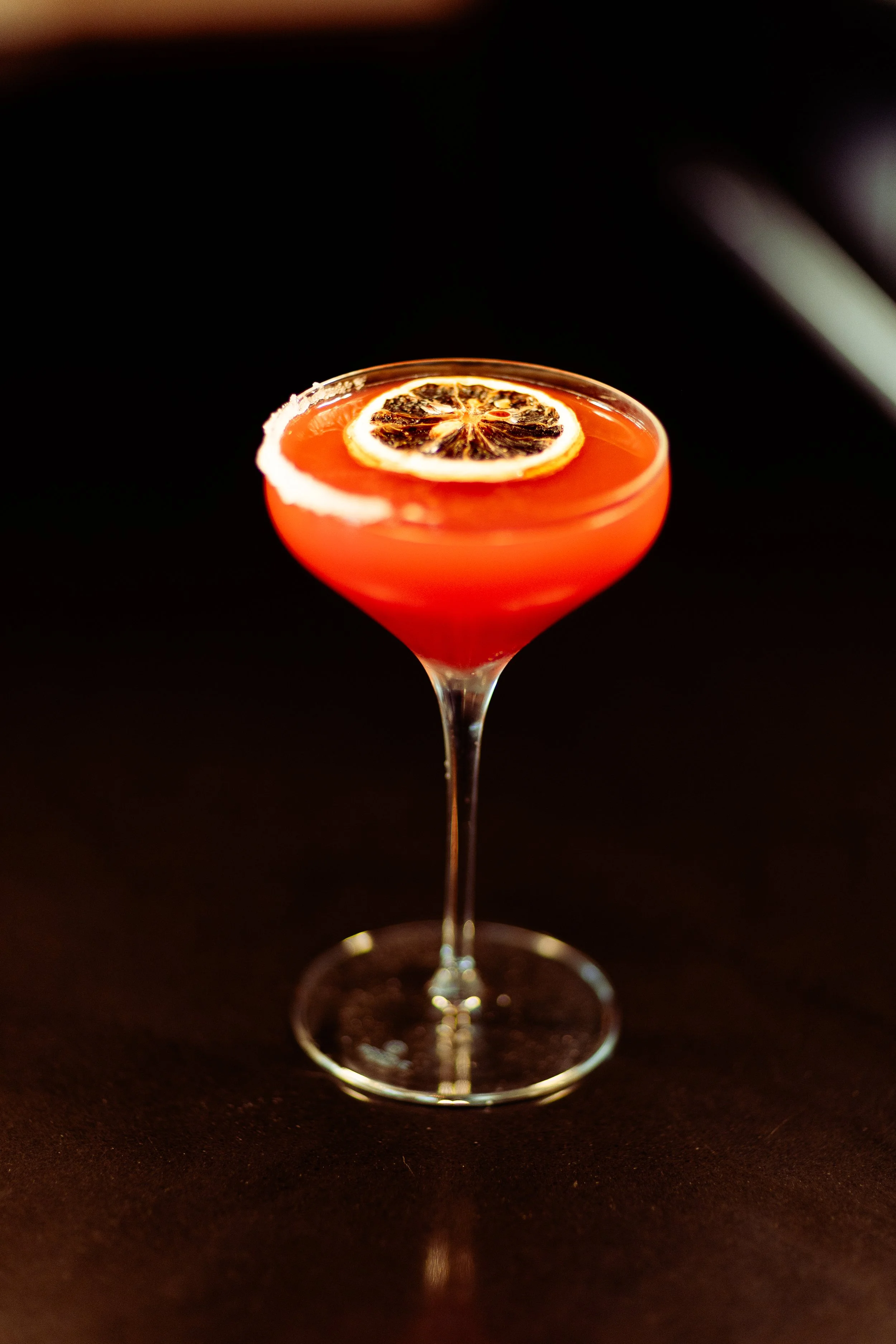 Cognac, orange liqueur, lemon juice, blood orange syrup