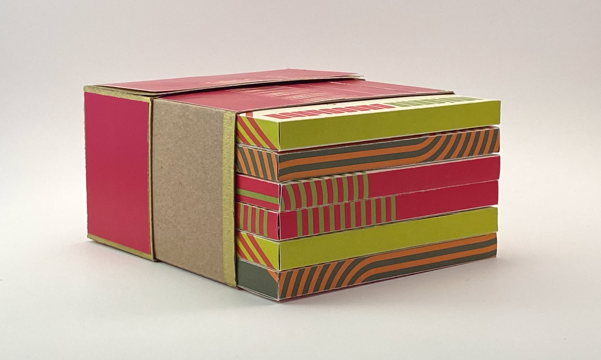 Indígena Chocolate. Mock-up, exterior box open with display of individual chocolate bars in exterior box, 02