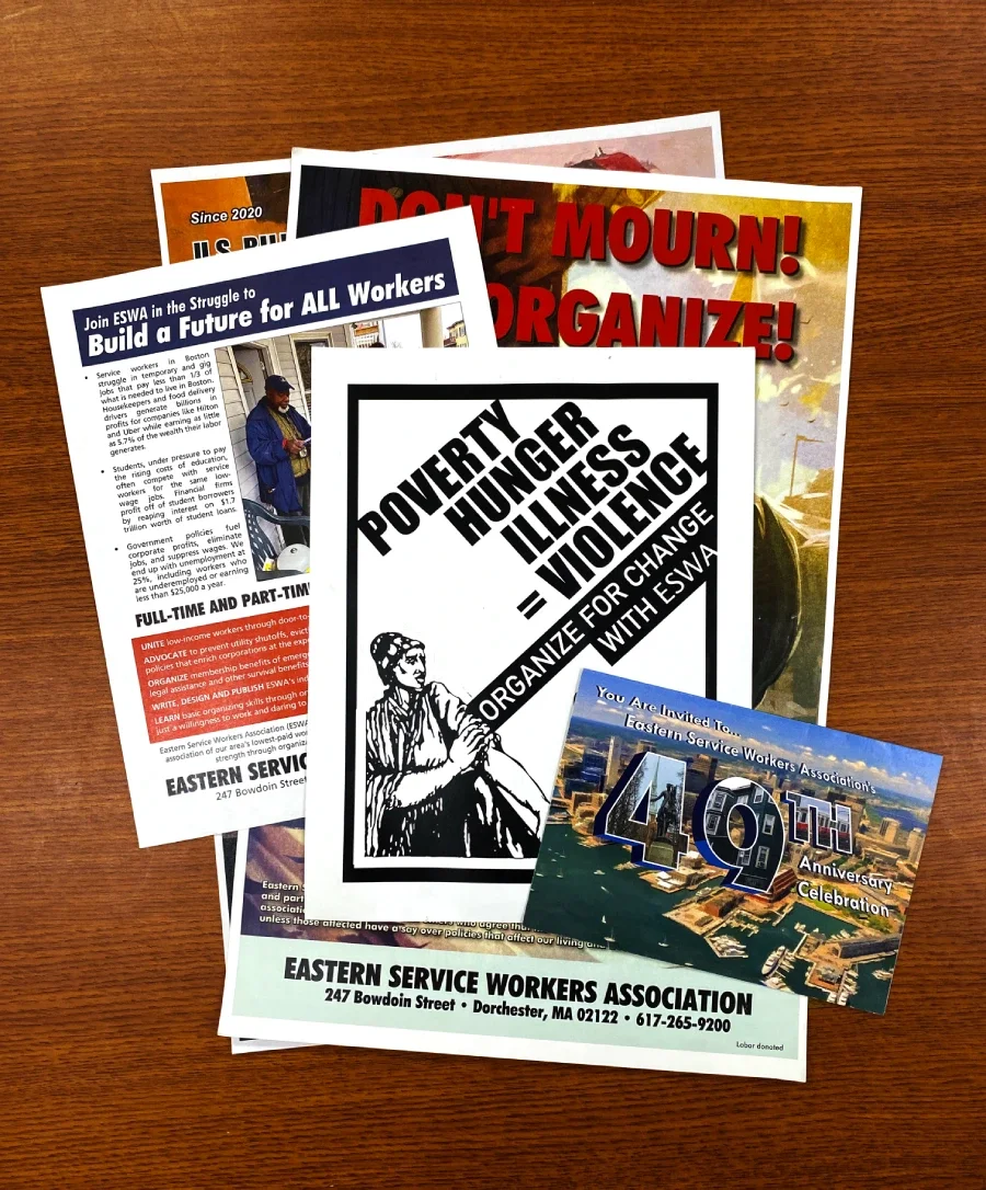 Photo of a variety of colorful flyers, posters, and an invitation card.