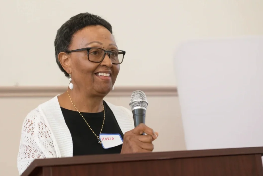 ESWA member speaking at a podium.