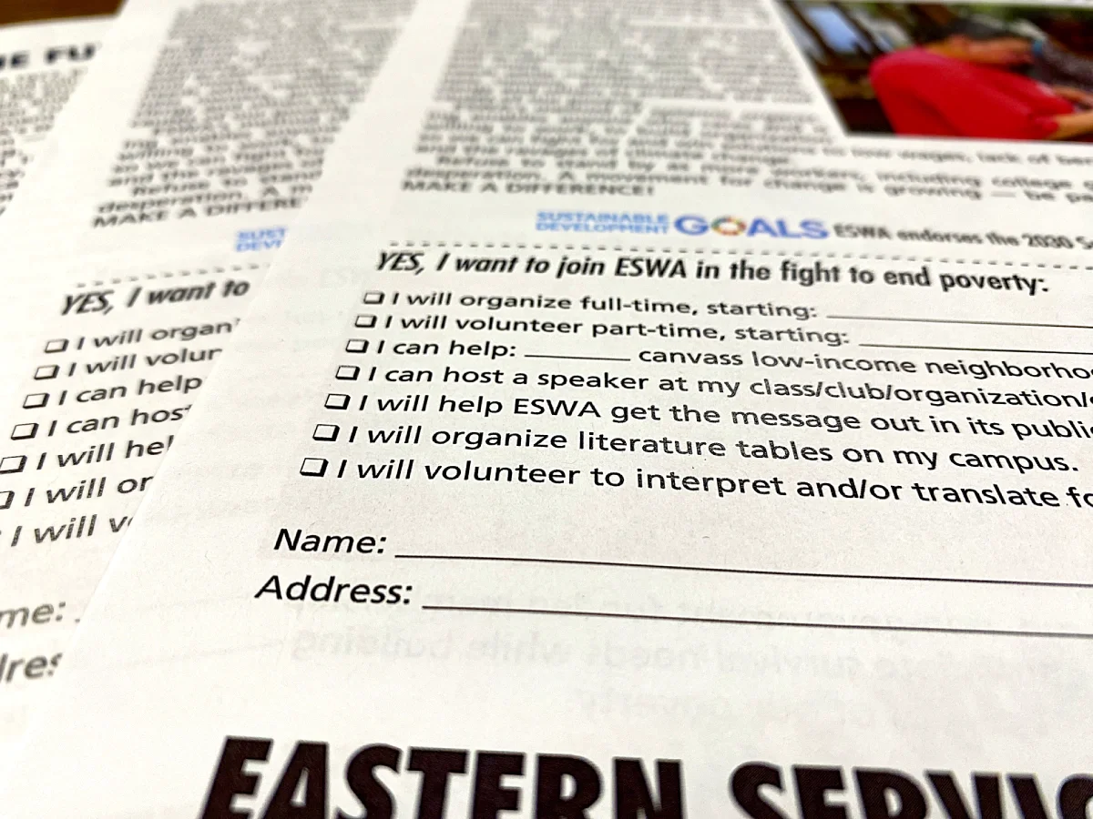 Close-up photo of the tear sheet section of an ESWA flyer that reads, "YES, I want to join ESWA in the fight to end poverty" above checkboxes with a list of what volunteers can do.