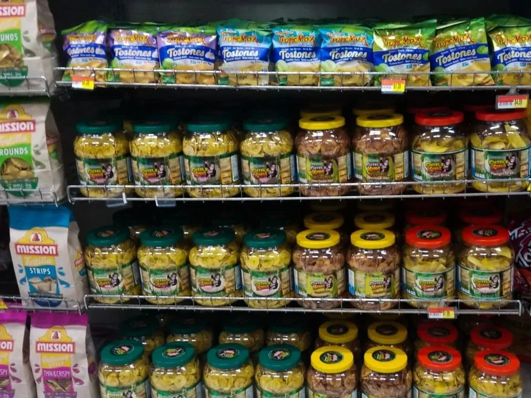 Chifle Kong plantain chips jars on the grocery store shelf