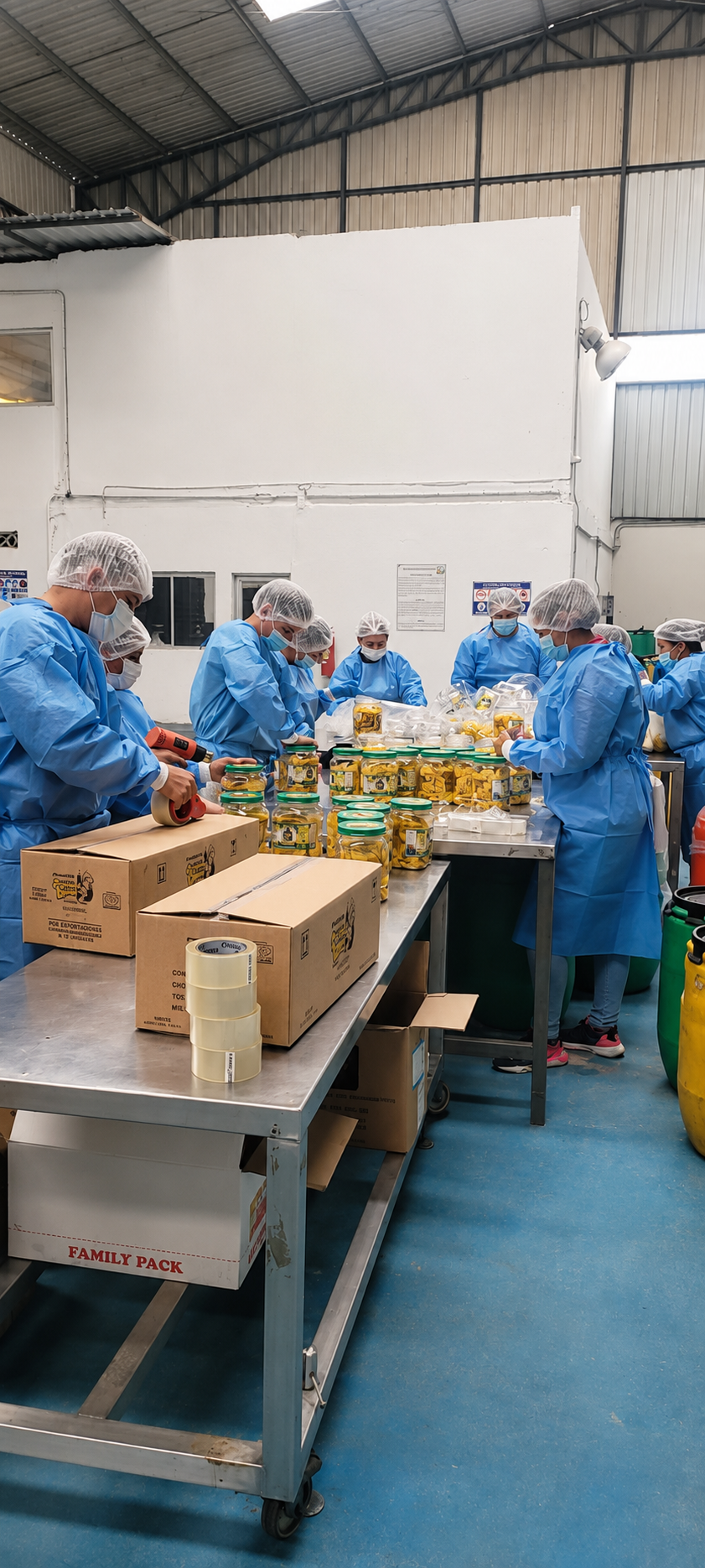 Chifle Kong team hand-packing plantain chips at the facility