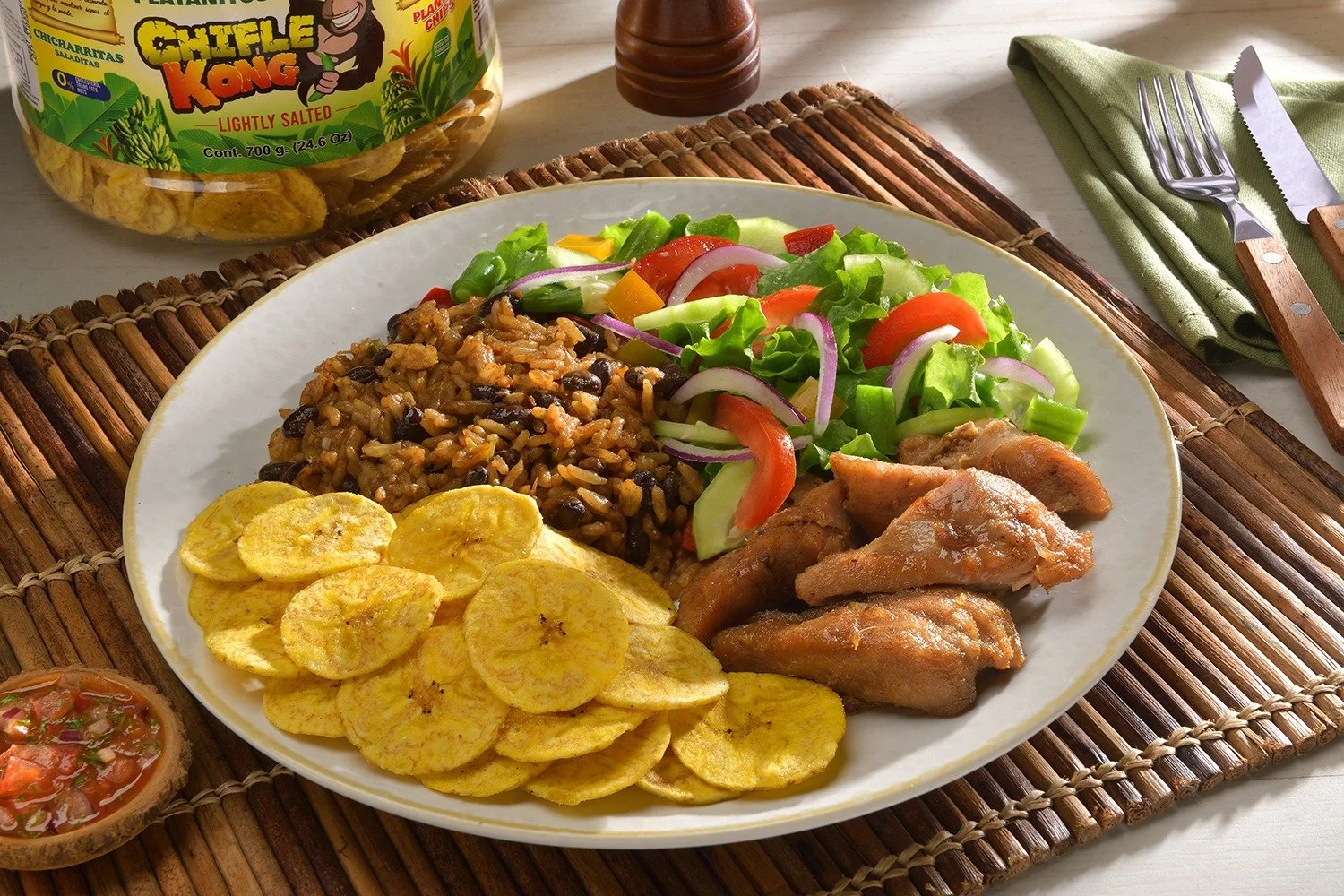 Chifle Kong plantain chips served with grilled chicken and rice