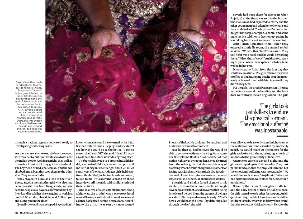 A magazine spread featuring text and a picture of a woman holding a pink and blue embroidered fabric with intricate gold and silver designs.