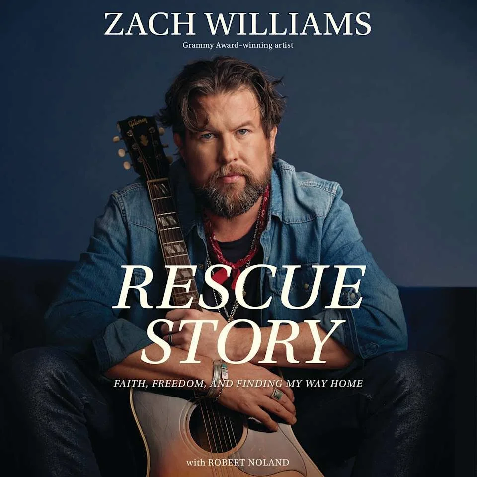 Book cover of 'Rescue Story' by Zach Williams featuring a man with a beard and mustache, wearing a denim shirt, holding a guitar, sitting against a blue background.