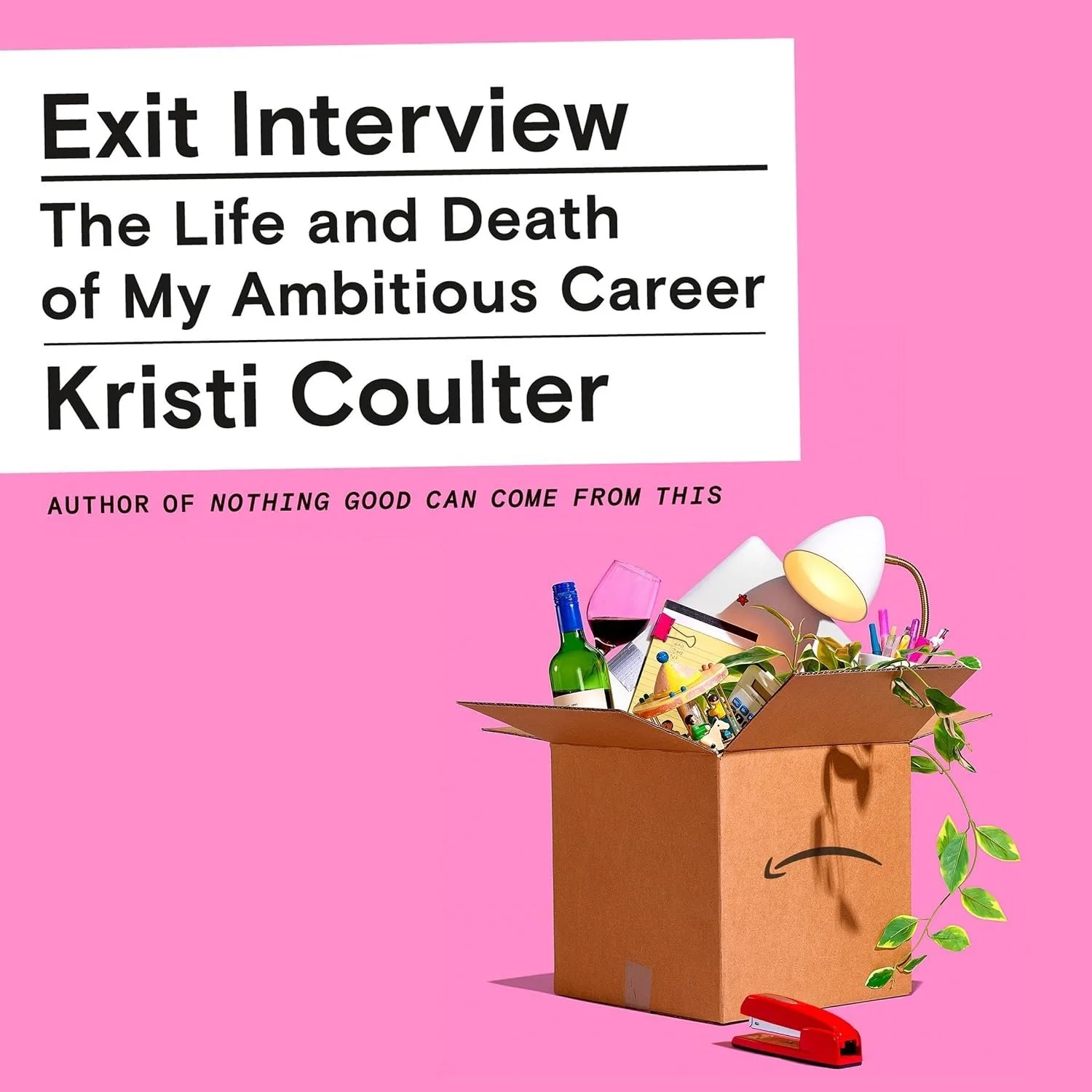Book cover with pink background, title 'Exit Interview: The Life and Death of My Ambitious Career' by Kristi Coulter, and a cardboard box filled with various items, including a wine bottle, red wine glass, a desk lamp, plant, pen holder with pens, and a stapler.