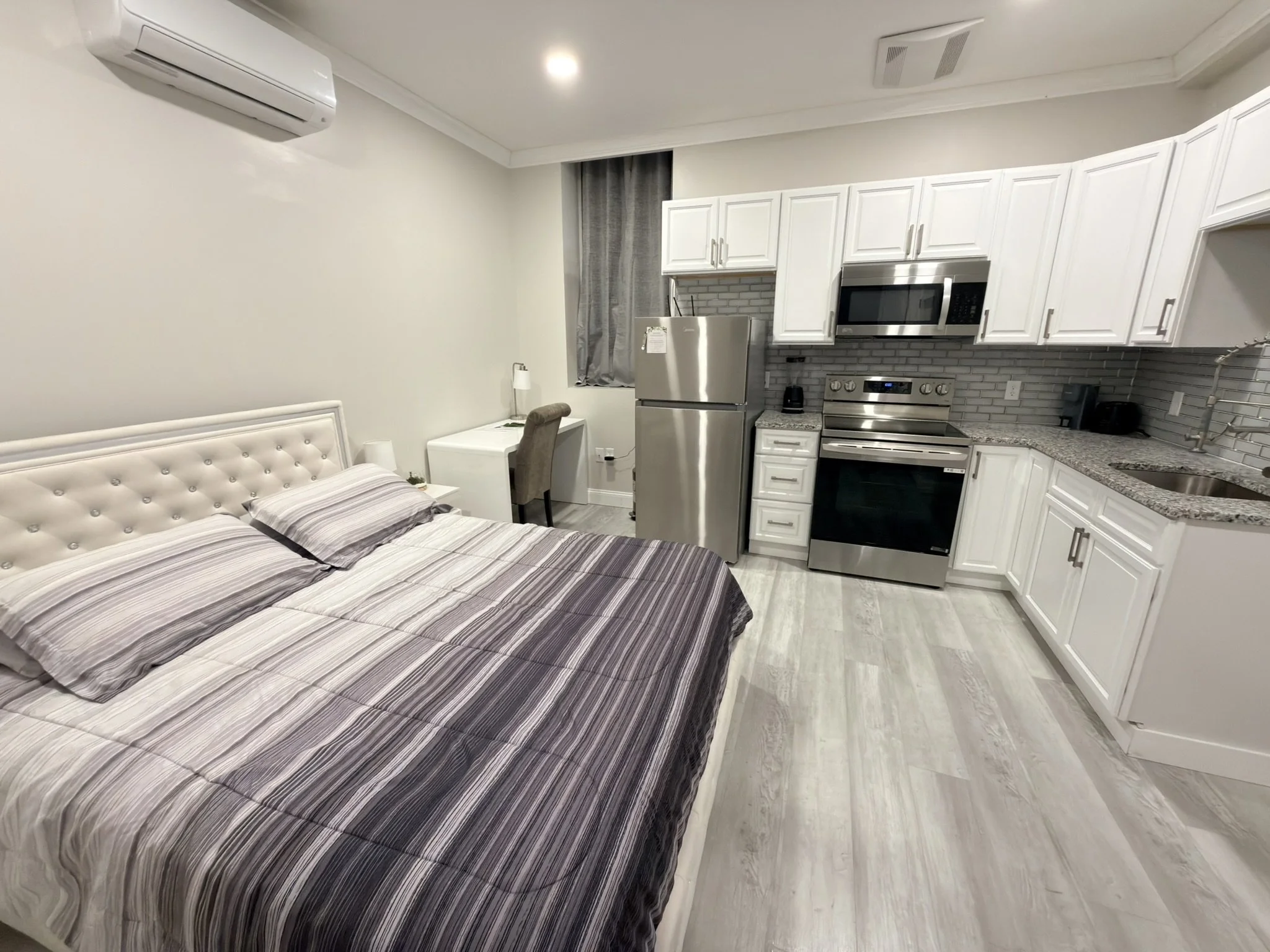Clean and organized studio prepared for a guest.