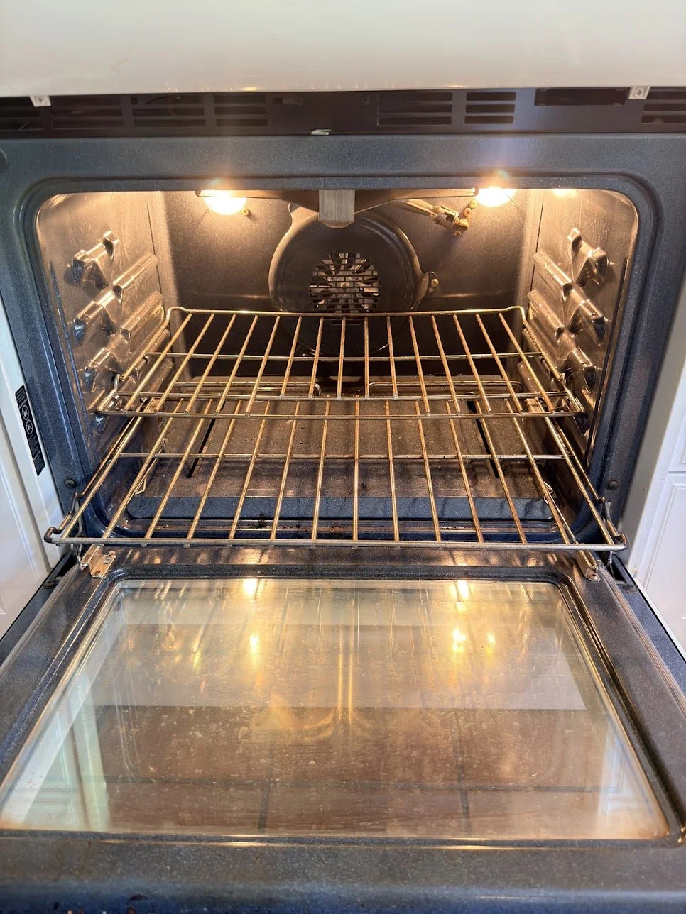 Oven before a detailed deep cleaning service.