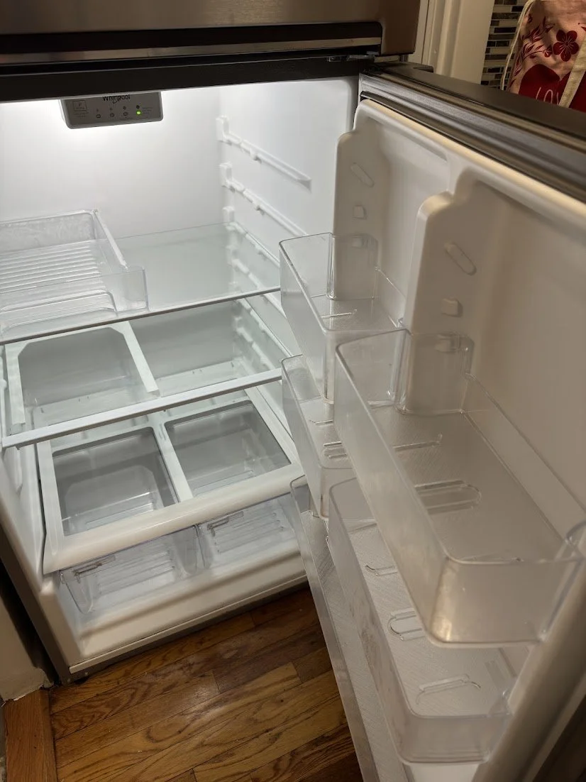 Clean and empty refrigerator ready for the next resident.