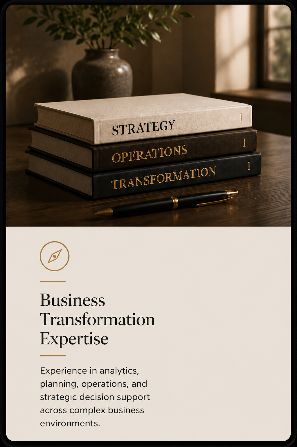Image of four stacked books titled "Strategy," "Operations," and "Transformation" on a wooden table, with a black pen in front, and a potted plant near a window in the background. The lower part of the image shows text about business transformation expertise.