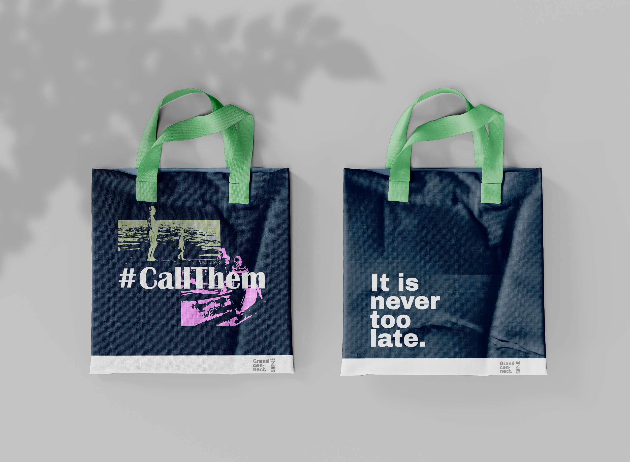 Two dark blue tote bags with green handles and motivational text, one with an illustration of a person walking by the water and the hashtag #CallThem, the other with the text "It is never too late."