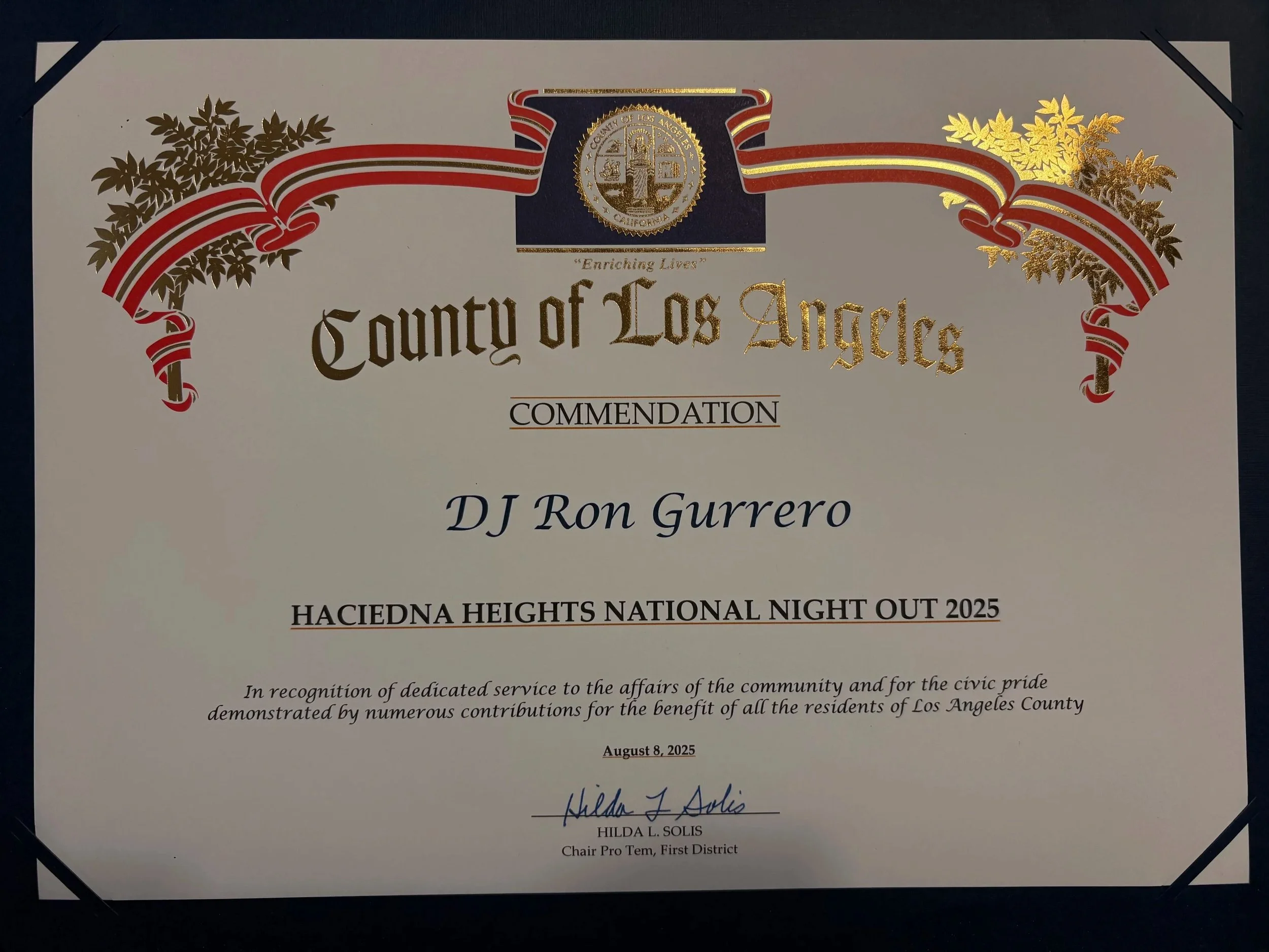Certificate of commendation from Los Angeles County, honoring DJ Ron Gurrero for his service at the Hacienda Heights National Night Out 2025, signed by Hilda J Solis.