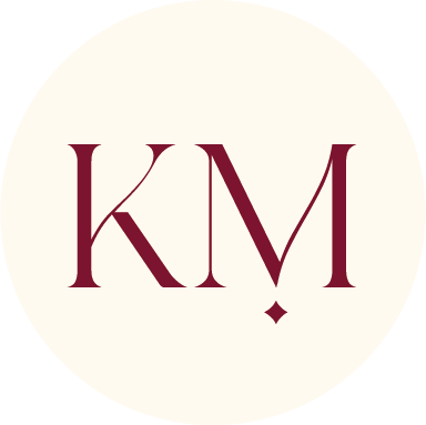 Lettermark logo with the initials 'KM' in maroon on a white circular background.