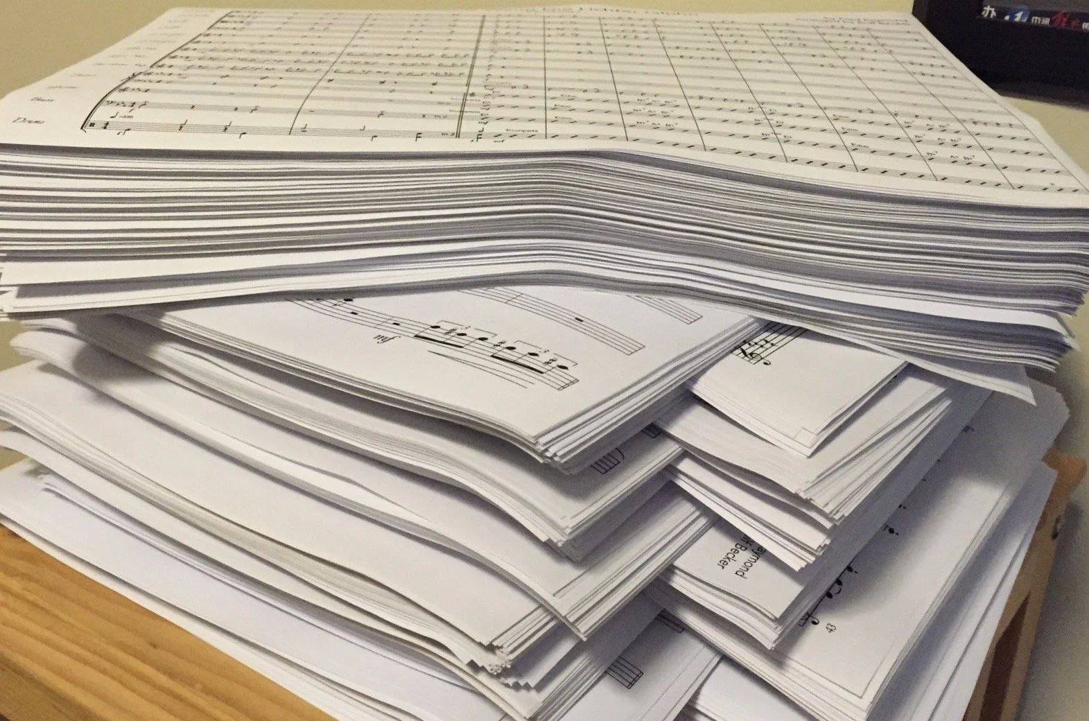 A large stack of Rolf Becker’s printed sheet music for a Big Band show.