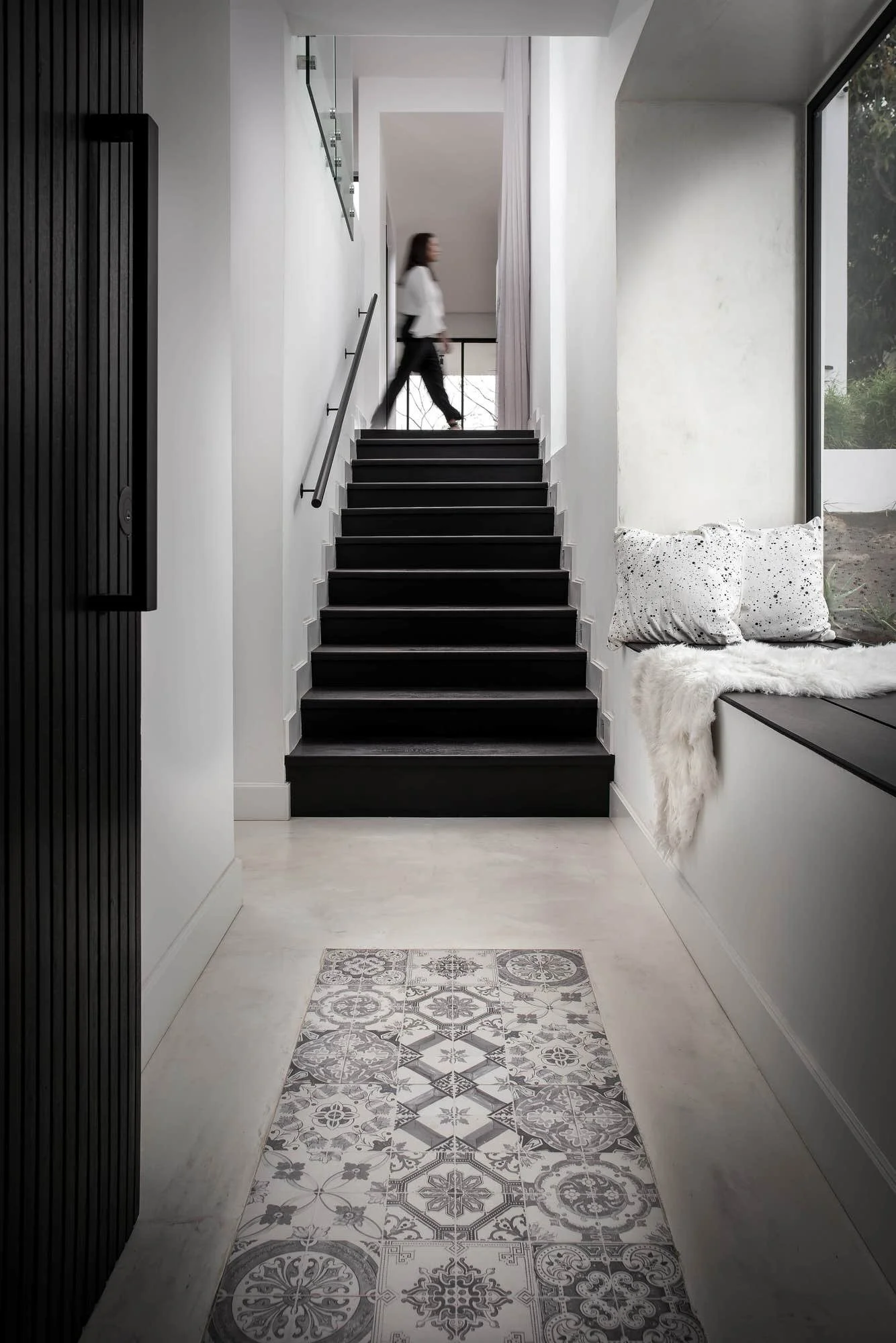 Infinity villa, Mauritius — minimalist interior staircase in black and white.