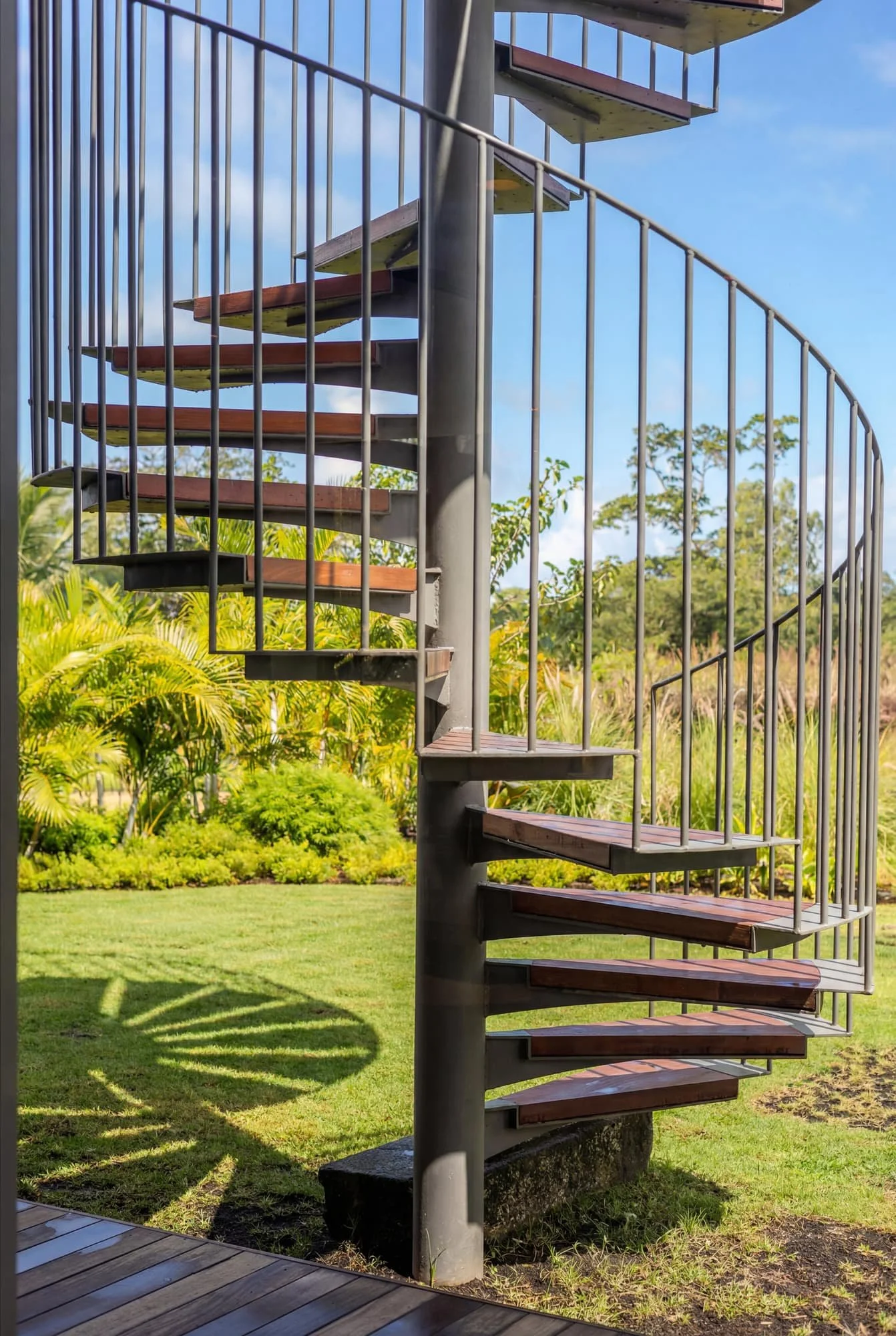 Villa Anahita H15 — exterior metal spiral staircase.
